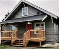 Gray House with New Porch-Missoula Cash Buyers